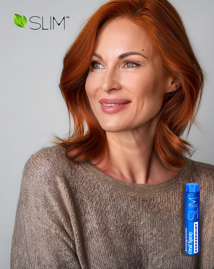 Fit redheaded woman facing forward smiling and Slim spray featured in bottom right corner